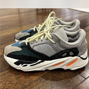 Gray and Black Sneakers with Orange Accents